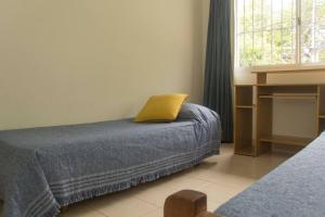 Postel nebo postele na pokoji v ubytování Duplex en Mendoza capital + 7 fotografií