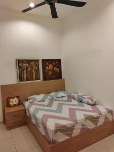 Letto o letti in una camera di Nice semi D house at Tangkak