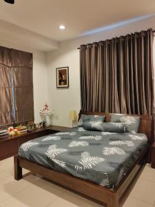 Letto o letti in una camera di Nice semi D house at Tangkak