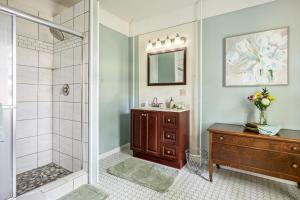 a bathroom with a shower and a sink at The Cottonwood Inn B&B in Empire