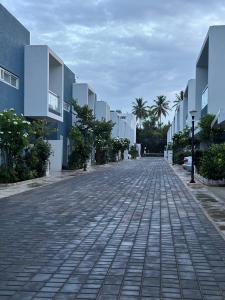 a cobblestone street in front of a building at The best villa stay- family friendly in Coimbatore