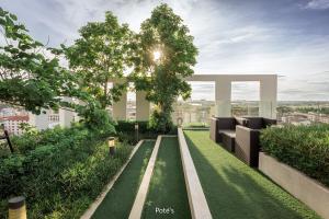 an architectural rendering of a garden on a building at 2BR Condo near DMK Airport/Joddfairs/Chatuchak in Ban Chuat Plai Mai