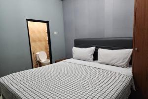 Postel nebo postele na pokoji v ubytování BARADA ROOMS