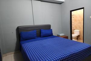 Ένα ή περισσότερα κρεβάτια σε δωμάτιο στο BARADA ROOMS