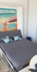 Posteľ alebo postele v izbe v ubytovaní studio Vue mer au cœur de malo les bains pieds dans l eau