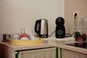 a kitchen counter with a tray of dishes on it at N'incanto in Rutigliano