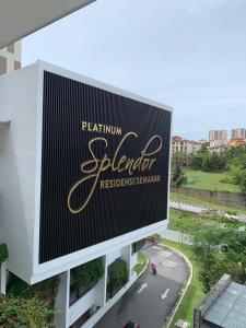 a large sign on the side of a building at Irizz Inn @Homestay Platinum Splendor in Kuala Lumpur