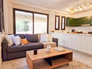 Posezení v ubytování Jasmine Dreams 1bed Apt Wpool