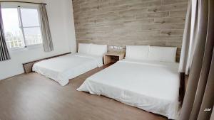 Ένα ή περισσότερα κρεβάτια σε δωμάτιο στο Summer Hill Homestay