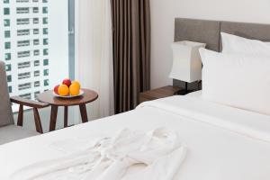 Postel nebo postele na pokoji v ubytování Gosia Hotel