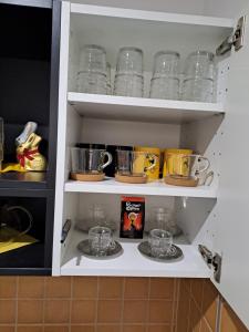 Kuchyňa alebo kuchynka v ubytovaní DISZTINGVÁLT Apartman, free garage