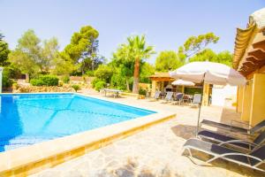 Bazén v ubytovaní Perfecta villa para vacaciones con wifi y A/C alebo v jeho blízkosti