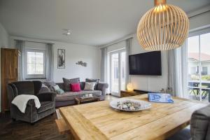 Posezení v ubytování Haus in idyllischer Lage mit Sauna, Terrasse und Garten - Villa Morgensünn