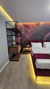 Cama o camas de una habitación en City Center Apartment