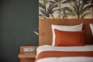 Postel nebo postele na pokoji v ubytování Van der Valk Hotel Breukelen