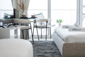 Letto o letti in una camera di Executive Studio in Damac Hills by Suiteable