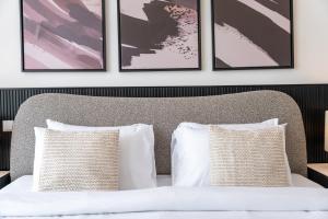 Letto o letti in una camera di Executive Studio in Damac Hills by Suiteable