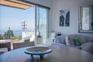Posezení v ubytování Attico Capri
