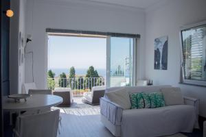 Posezení v ubytování Attico Capri