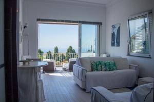 Posezení v ubytování Attico Capri