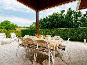 Balkón nebo terasa v ubytování Holiday Home Narcisse by Interhome