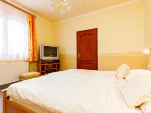 Postel nebo postele na pokoji v ubytování Holiday Home Narcisse by Interhome