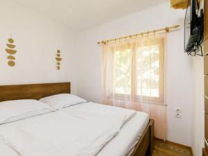 Postel nebo postele na pokoji v ubytování Apartment Liget by Interhome