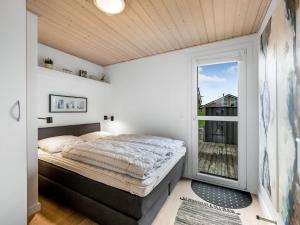 Postel nebo postele na pokoji v ubytování Holiday Home Samuil - 300m to the inlet in The Liim Fiord by Interhome