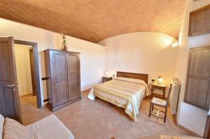 Voodi või voodid majutusasutuse Casa ai Carfini toas