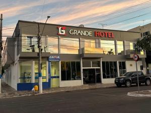 a car parked in front of a grande hotel at Grande Hotel in Gurupi