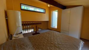 a bedroom with a bed and a window at Panoramer in Théoule-sur-Mer +23 photos