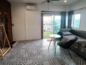 منطقة جلوس في Merit Courtyard Suvarnabhumi House