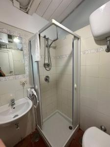 a bathroom with a shower and a sink at Depandance Casa Paolina in Capri +35 photos