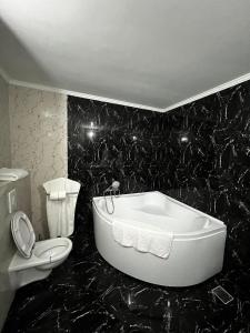 Kúpeľňa v ubytovaní Casa moderna in Mineri