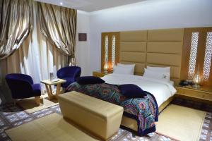 Postel nebo postele na pokoji v ubytování Aralia Boutique Hôtel
