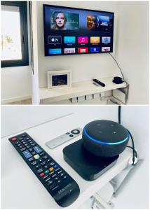 a desk with a remote control and a tv at Apartamento en Ametlla de Mar SEA VIEW HAUS FREE WIFI in L'Ametlla de Mar