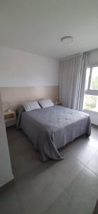 Ένα ή περισσότερα κρεβάτια σε δωμάτιο στο Alojamiento MAR