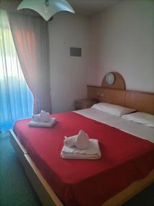 Кровать или кровати в номере Hotel Vael