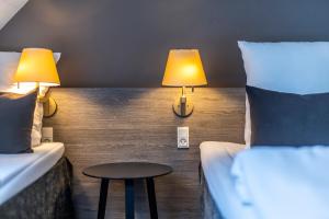 Voodi või voodid majutusasutuse Comwell Bygholm Park toas