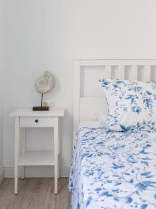 Postel nebo postele na pokoji v ubytování Marejada Coastal Suite