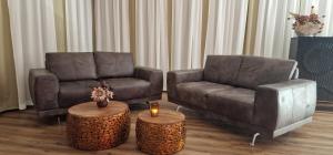 Area soggiorno di Privat-Spa mit Whirlpool und Sauna in Sursee