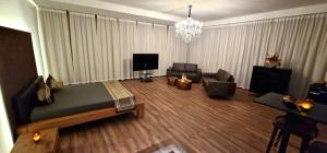 TV o dispositivi per l'intrattenimento presso Privat-Spa mit Whirlpool und Sauna in Sursee