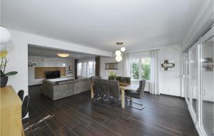 an open living room and dining room with a table and chairs at Villa Angelina in Nin +37 photos