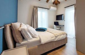 Giường trong phòng chung tại Villa Eden Hill