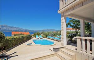 a villa with a swimming pool and a patio at Villa Veritas in Lumbarda +15 photos