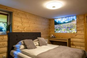 Posteľ alebo postele v izbe v ubytovaní APLIT GUEST HOUSE