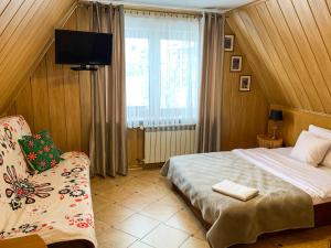 Posteľ alebo postele v izbe v ubytovaní APLIT GUEST HOUSE
