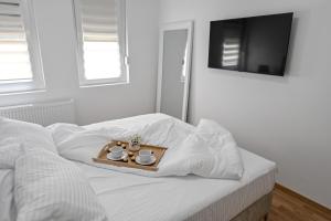 Postel nebo postele na pokoji v ubytování Porto lux