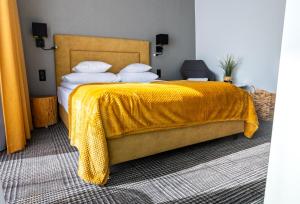 Posteľ alebo postele v izbe v ubytovaní APLIT GUEST HOUSE
