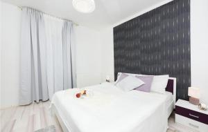 Postel nebo postele na pokoji v ubytování Villa Mateo